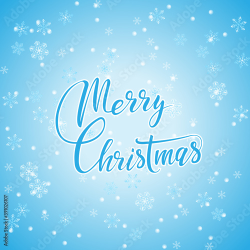 Merry Christmas hand lettering calligraphic on cold winter background with snowflakes.