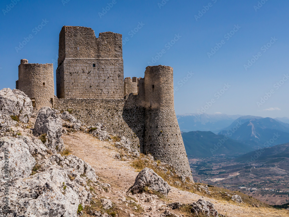 Impressive view of Rocca Calascio ruins, ancient medieval fortress in Gran Sasso National Park, Abruzzo region, Italy
