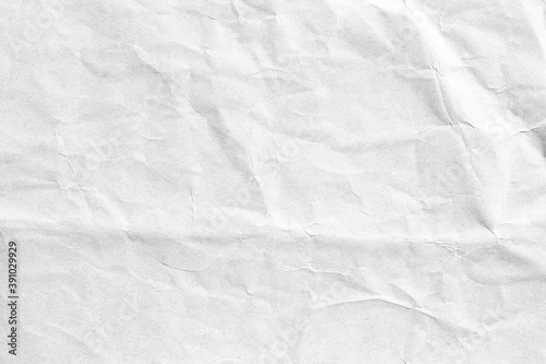 Crumpled white surface paper background texture 