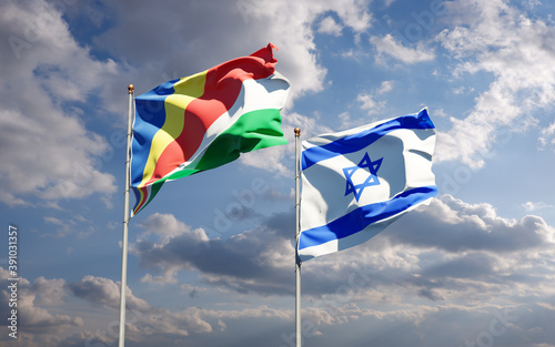 Beautiful national state flags of Seychelles and Israel together at the sky background. 3D artwork concept. © Leo Altman