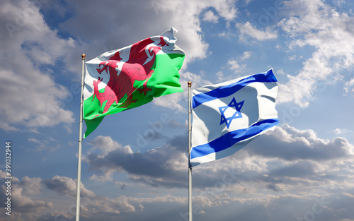 Beautiful national state flags of Wales and Israel together at the sky background. 3D artwork concept. © Leo Altman