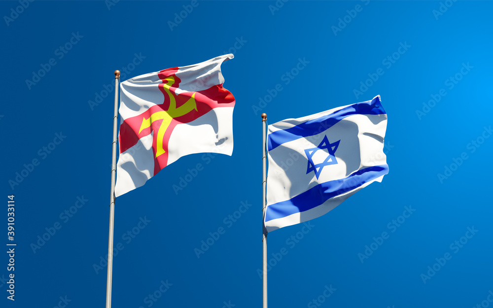 Beautiful national state flags of Guernsey and Israel together at the sky background. 3D artwork concept. Beautiful national state flags of Guernsey and Israel together at the sky background. 3D artwork concept.