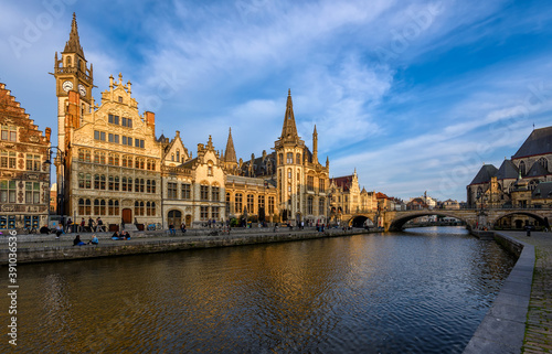 View of Graslei, Korenlei quays and Leie river in the historic city center in Ghent (Gent), Belgium. Architecture and landmark of Ghent. Sunset cityscape of Ghent. © Ekaterina Belova