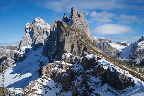 Beautiful mountain group covered with the first snow in the dolomites 2020