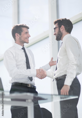 friendly handshake of business colleagues