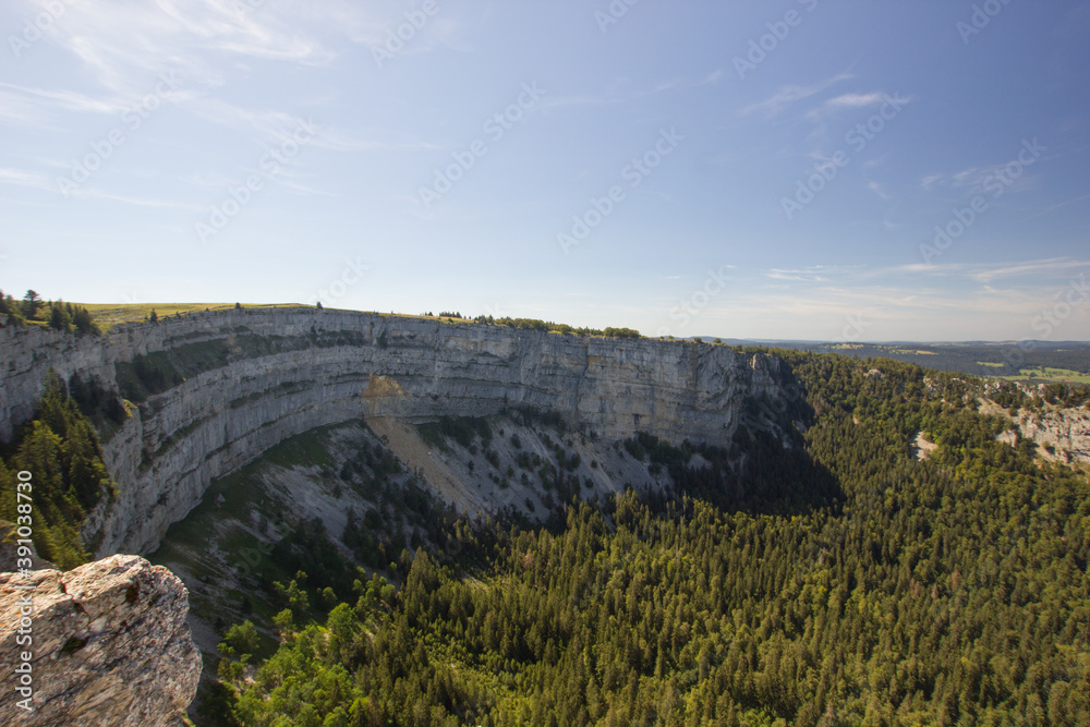 On the top of the Creux du Van mountain in Switzerland On the top of the Creux du Van mountain in Switzerland