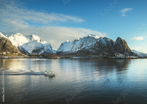 fishing boat and Reine Village, Lofoten Islands, Norway