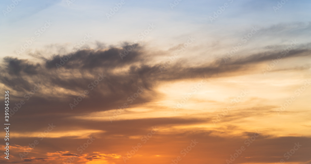 sunset sky with clouds in the evening