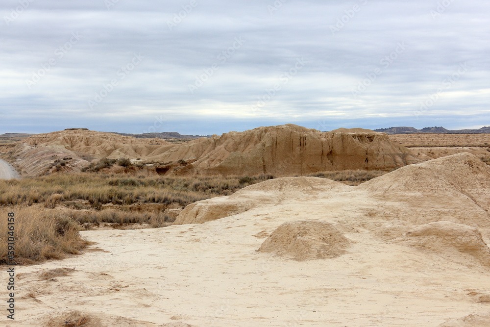 Desert landscape in a cloudy day in Bardenas Reales of Navarra, Spain.