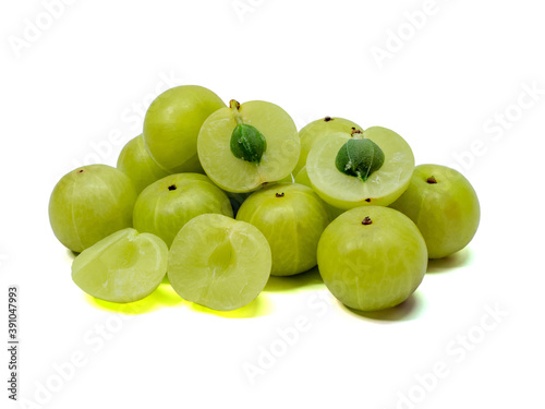 pile of Indian gooseberry ,Phyllanthus emblica , amla green fruits isolated on white background. This has clipping path.