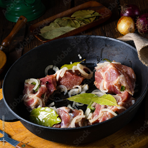 Raw East Frisian Snirtje roast with spices. photo