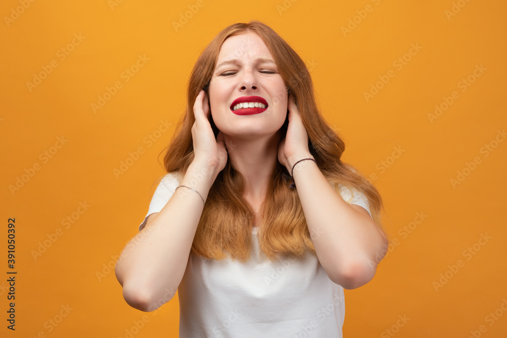 Pretty girl covering ears with hands. Deaf concept Pretty girl covering ears with hands. Deaf concept