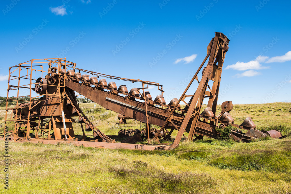 Abandoned gold mining machine in Tierra del Fuego in Chile Abandoned gold mining machine in Tierra del Fuego in Chile