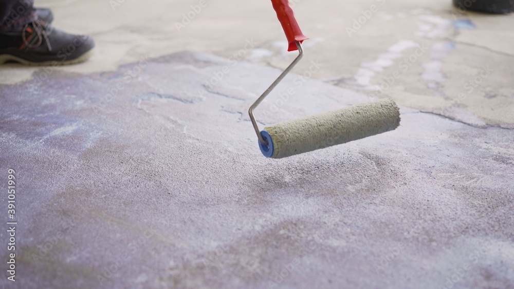 Concrete floor priming is the final preparatory stage for surface