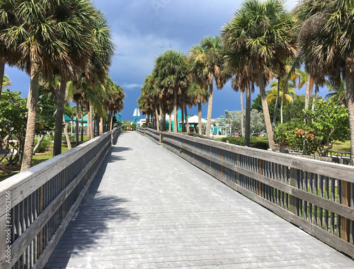 Boardwalk to the beach at Bowditch Point Regional Park.   Bowditch is located at the northern tip of Estero Island on Fort Myers Beach, Florida, USA. © Jillian Cain