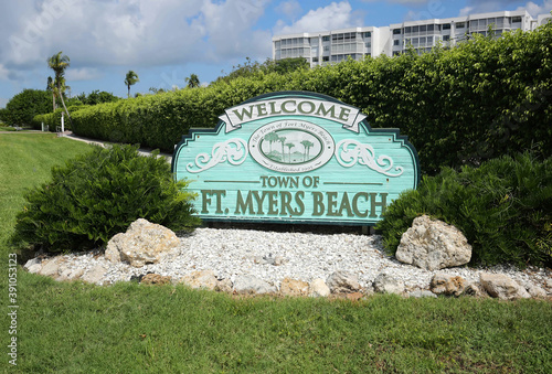 Fort Myers Beach welcome sign greets tourists as they reach Estero Island on the west coast of Florida, a popular tourist destination.  photo