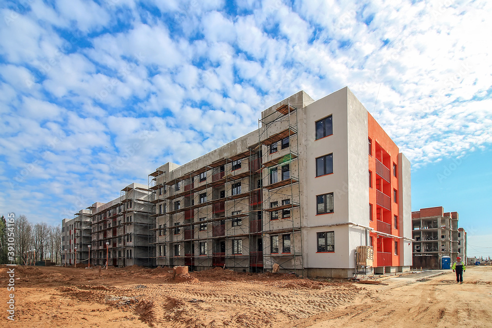 Scaffolding On Facade Of House Construction Workers In Scaffolding On
