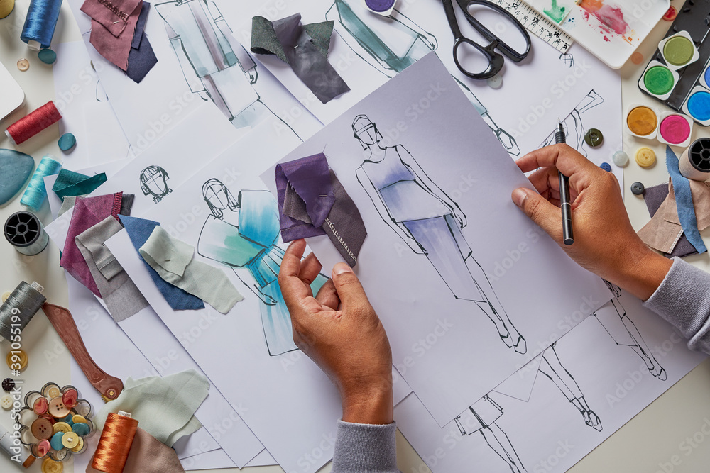 Fashion designer stylish drawings sketches textile fabric material Costume. Designer creative workshop studio. Fashion designer stylish drawings sketches textile fabric material Costume. Designer creative workshop studio.