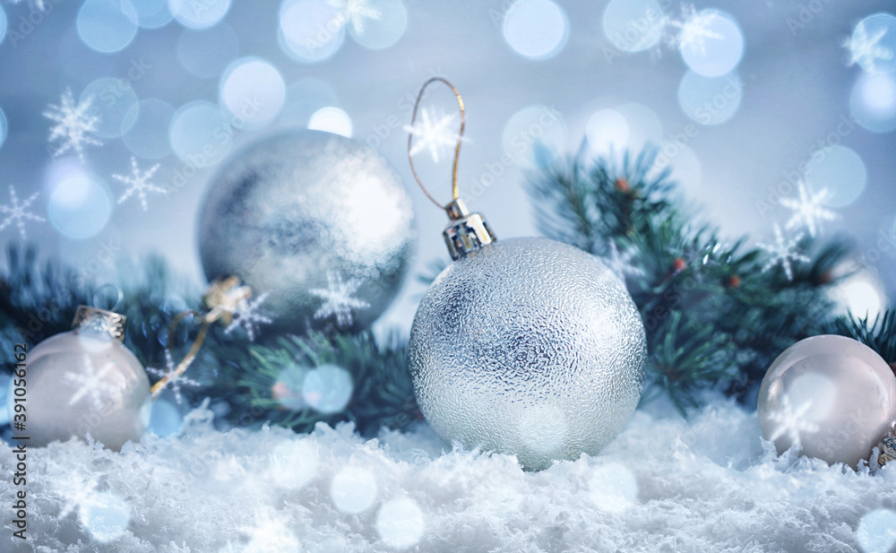 Greeting card design with beautiful Christmas balls and snowflakes, bokeh effect Greeting card design with beautiful Christmas balls and snowflakes, bokeh effect