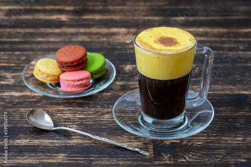 Traditional vietnamese egg coffee made of raw egg yolk and condensed milk, close up photo