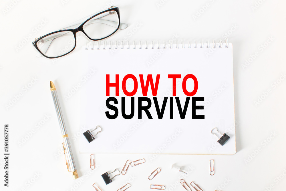 text HOW TO SURVIVE in a magnifying glass, office concept, business concept, Finance text HOW TO SURVIVE in a magnifying glass, office concept, business concept, Finance