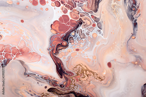 Acrylic Fluid Art. Brown bubbles, peach waves and gold inclusion. Abstract stone background or texture