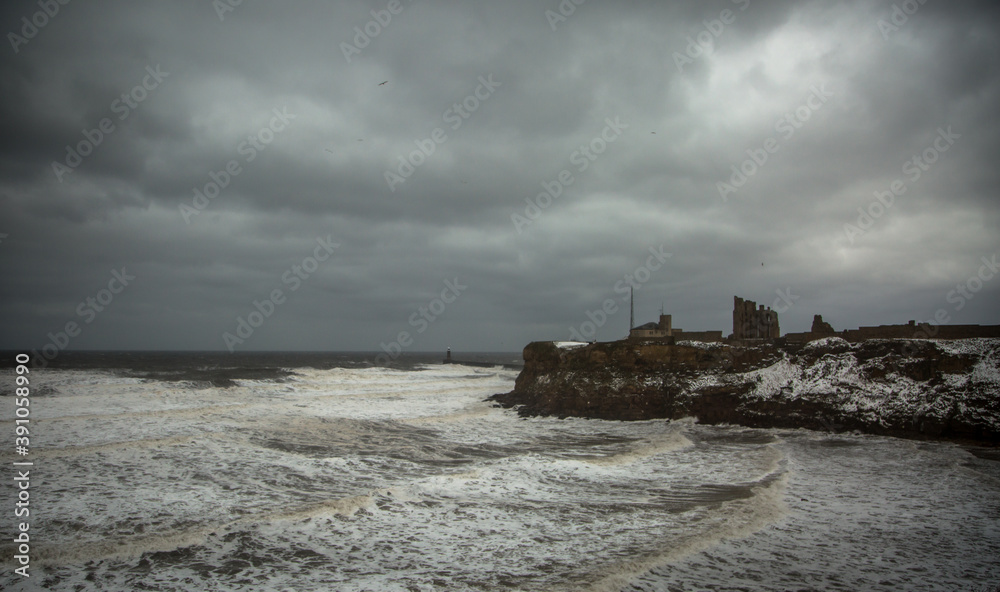 Giant waves batter King Edward's Bay during a winter storm, as the surrounding cliffs by Tynemouth Priory are covered with a sprinkling of snow Giant waves batter King Edward's Bay during a winter storm, as the surrounding cliffs by Tynemouth Priory are covered with a sprinkling of snow