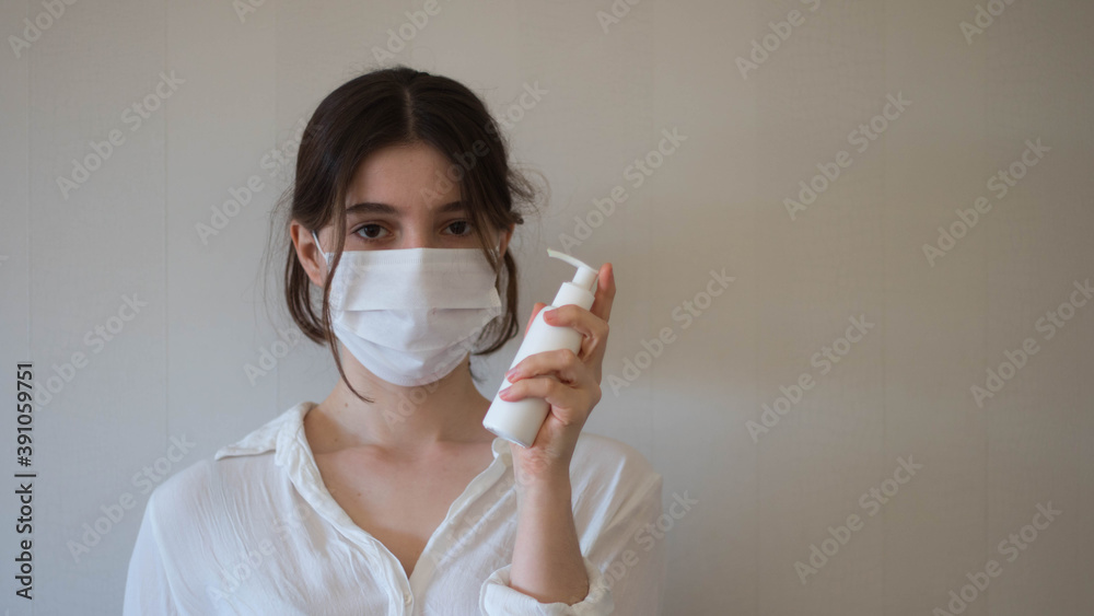 A person using a hand sanitizer, cleaning hands during a pandemic, applying a hand sanitizer to the hands, a woman cleaning hands with a hand sanitizer A person using a hand sanitizer, cleaning hands during a pandemic, applying a hand sanitizer to the hands, a woman cleaning hands with a hand sanitizer