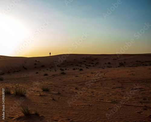 Picture of a boy in the desert.
