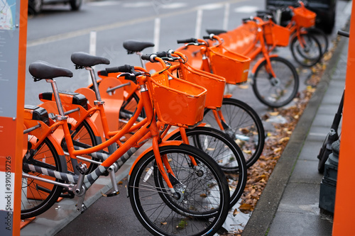 bicycle, bike, city, cycle, ecology, group, healthy, lifestyle, old, orange, outdoor, portland, public, rent, rental, ride, road, row, sport, street, tourism, transport, transportation, travel, urban,