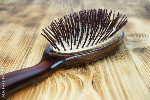 comb with the hair. concept of hair loss  baldness  hair problems