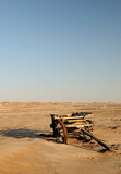 A forgotten ox wagon rusting away in the Namib desert long after the diamond diggers left