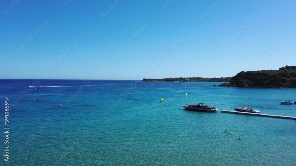Aerial view of a jet ski boat in a deep blue colored sea, Zakynthos, Greece Aerial view of a jet ski boat in a deep blue colored sea, Zakynthos, Greece