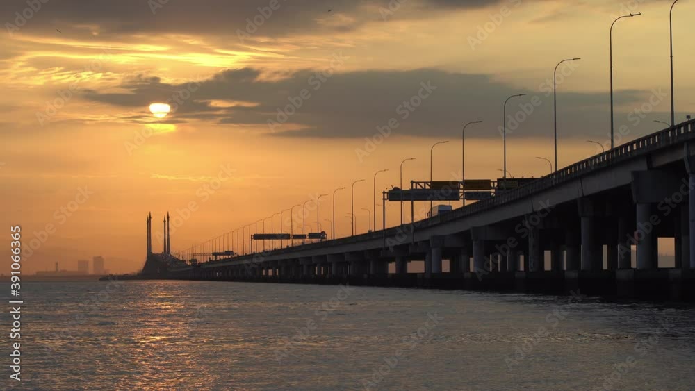 Timelapse the sun rise at mid span of Penang Bridge. Timelapse the sun rise at mid span of Penang Bridge.