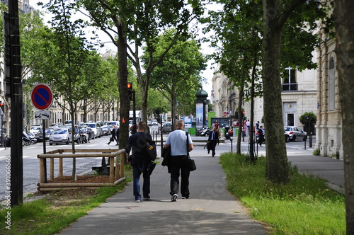 people walking on the street - Paris