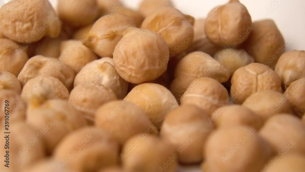 Chickpea beans close-up. Cicer arietinum. Macro shot. Falling legumes Chickpea beans close-up. Cicer arietinum. Macro shot. Falling legumes