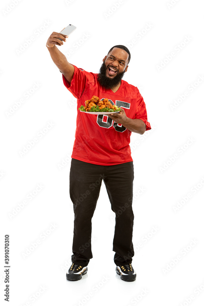 Fan: Sports Man Takes Photo With Platter Of Chicken Wings Fan: Sports Man Takes Photo With Platter Of Chicken Wings