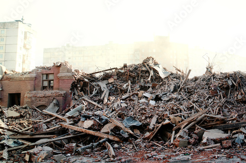 Pile of demolition rubble. Gray rubble at a building site.