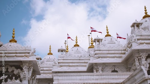 View of beautiful Swaminarayan temple with clouds in sky. At Bhuj, Kutch, India. photo