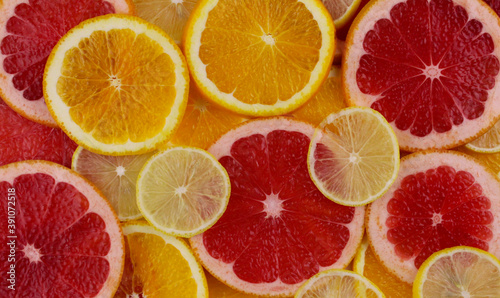 Background from citrus fruits. Bright fruit