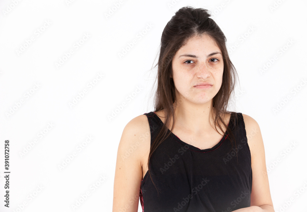 Contempt emotional girl on a light background Contempt emotional girl on a light background