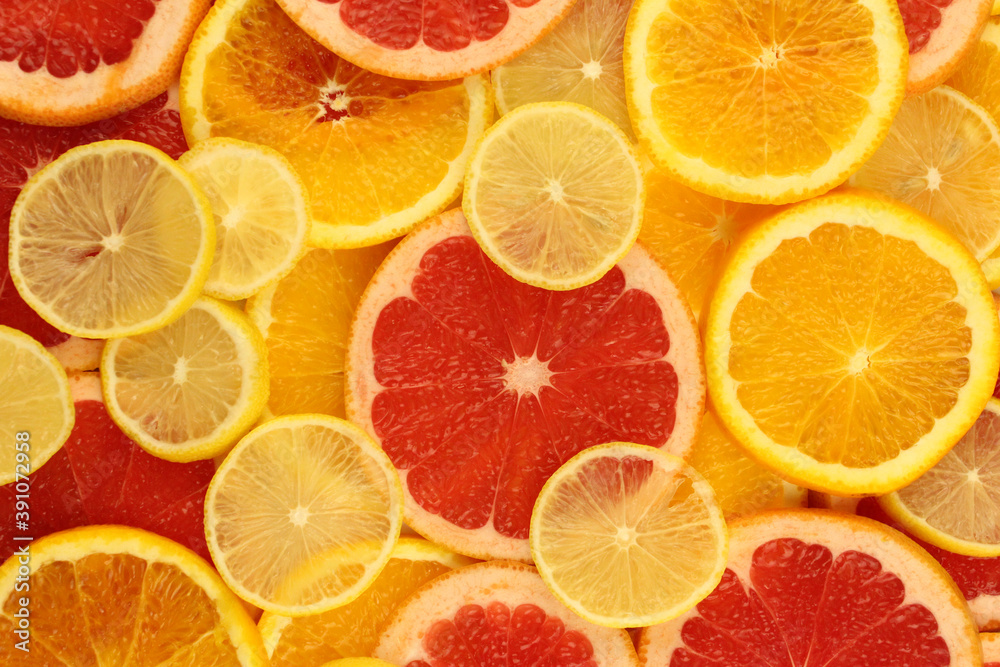 Background from citrus fruits. Bright fruit