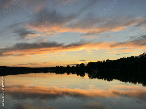 sunset over the lake © Olha