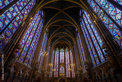The interior upper level of Sainte-Chapelle, the Gothic royal chapel on the Ile de la Cite in Paris France, highlighting it's stained glass windows