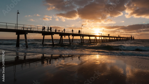 Silhouette of Glenelg Jetty at sunset, South Australia, Adelaide. © Victoria