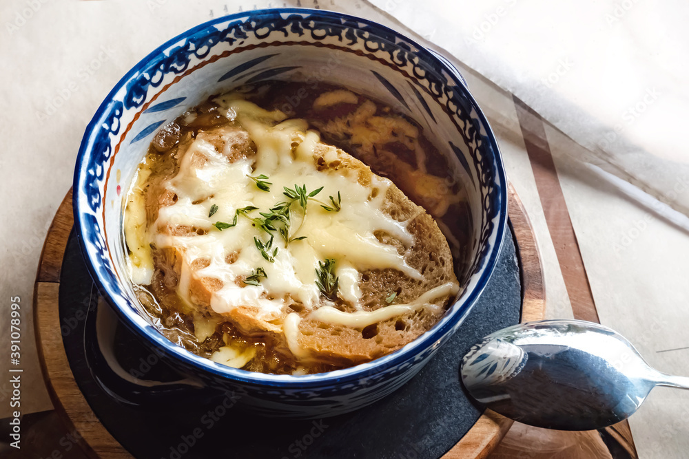 Bowl of traditional french onion soup close-up Bowl of traditional french onion soup close-up