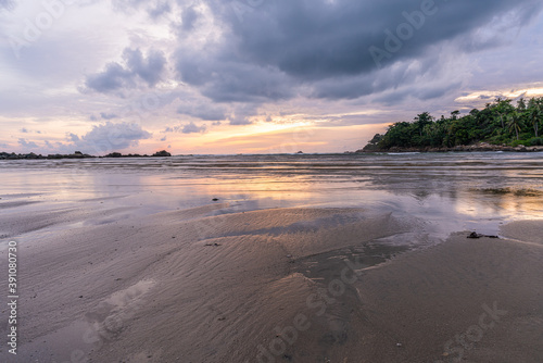 Sunset at Layan beach, lagoon in Phuket, Thailand during Low tide