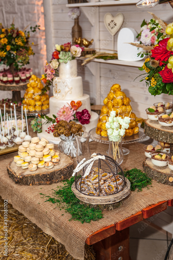 Dessert table with cake and candy on a wedding day Dessert table with cake and candy on a wedding day