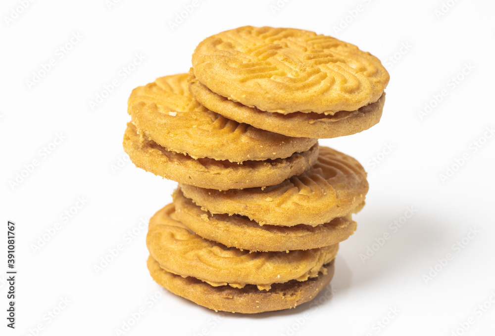 A stack of delicious rounded creamy biscuits close up look isolated on white background A stack of delicious rounded creamy biscuits close up look isolated on white background
