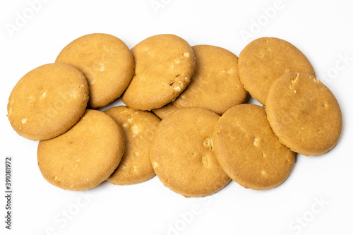 Delicious crispy rounded wheat biscuits decorated on a white background